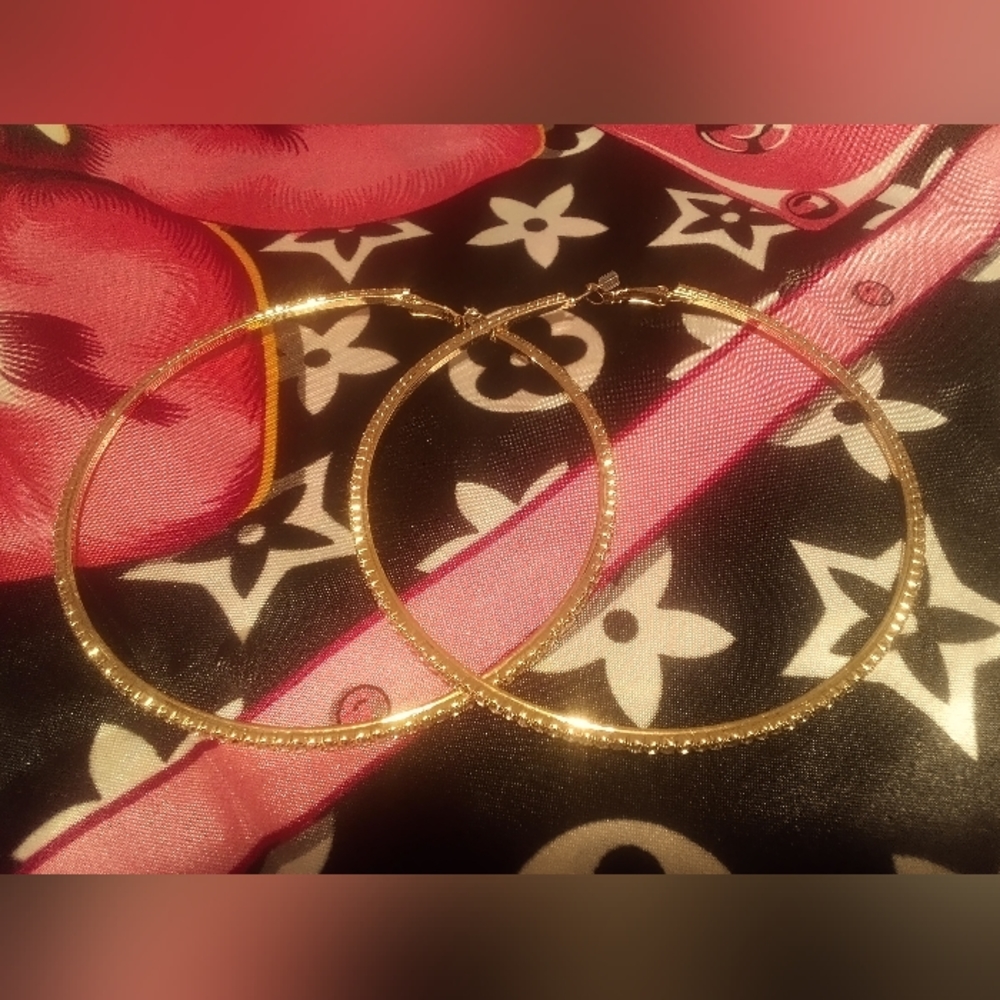 A Pair Of Gold Rhinestone Hoops